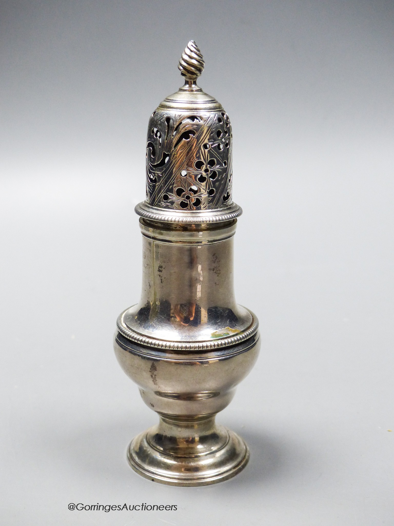 A George III silver baluster pepper, Daniell & Mince, London, 1770, 15.3cm, 140 grams.